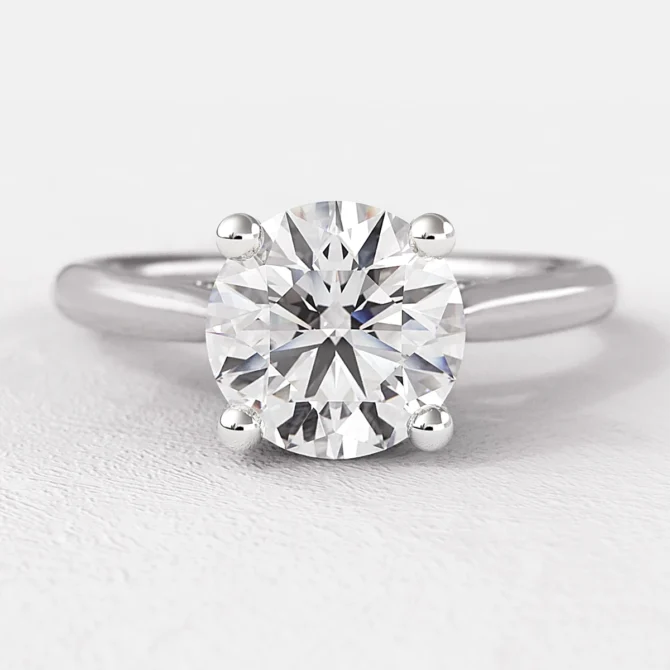 0.70ct Round Cut Diamond Ring With Diamond Bridge in White Gold SR1027