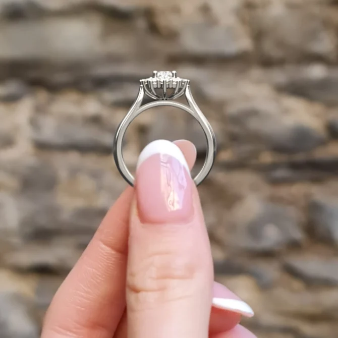 0.80ct Oval Cut Halo Engagement Ring VR1009 in 18k white gold side view in hand