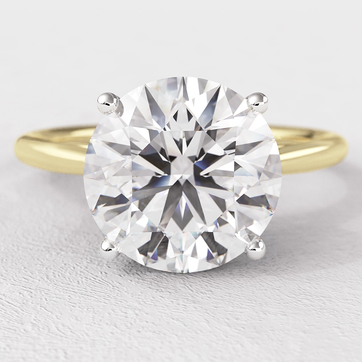 Round Four Claw Tulip Solitaire Diamond Ring