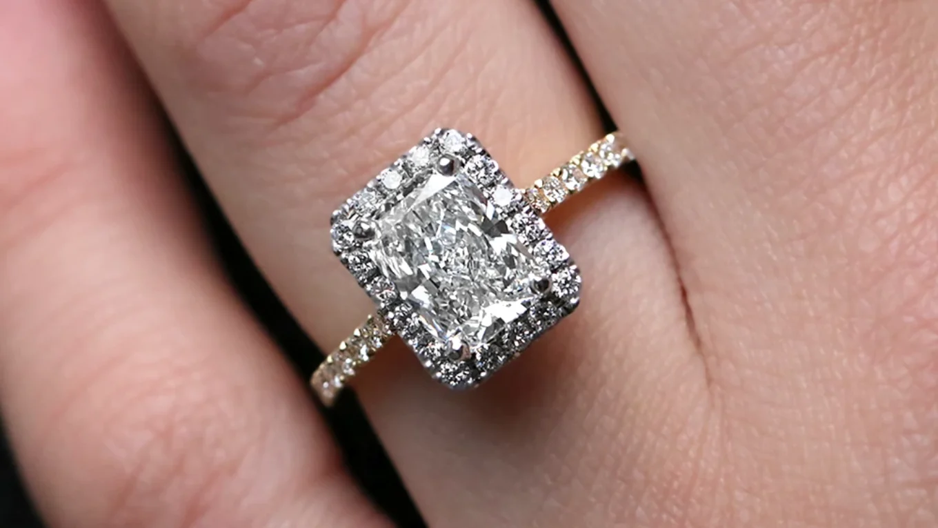 2.05ct Emerald Cut Claw Set Engagement Ring VR1104 in yellow gold on hand