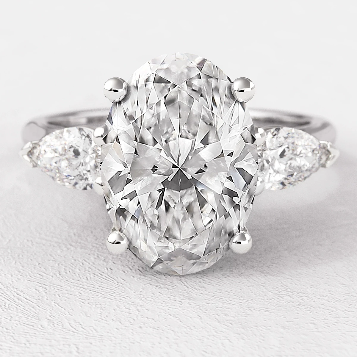 Oval And Pear Three Stone Diamond Engagement Ring TR1082