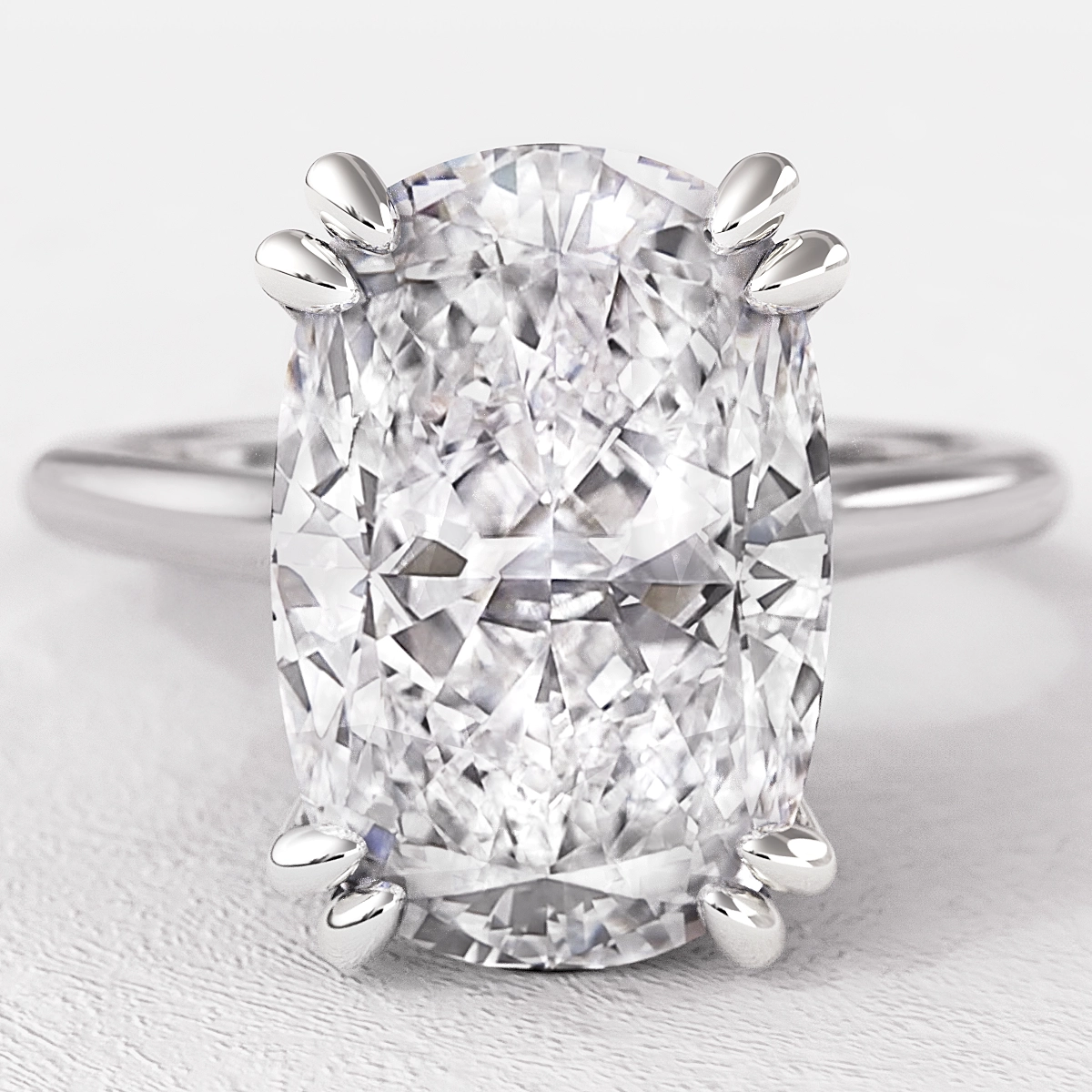 Elongated Cushion Cut Double Talon Claw Solitaire Ring