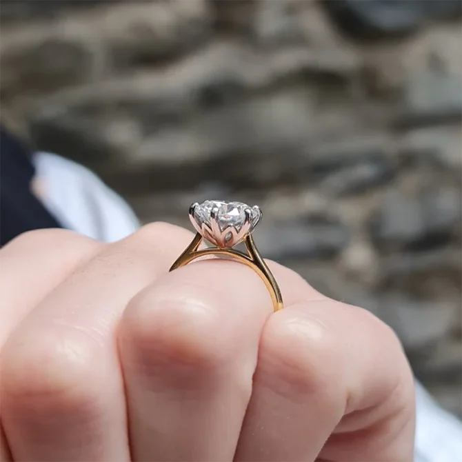 3ct six claw diamond engagement ring on thin yellow gold band on hand sr1025-3