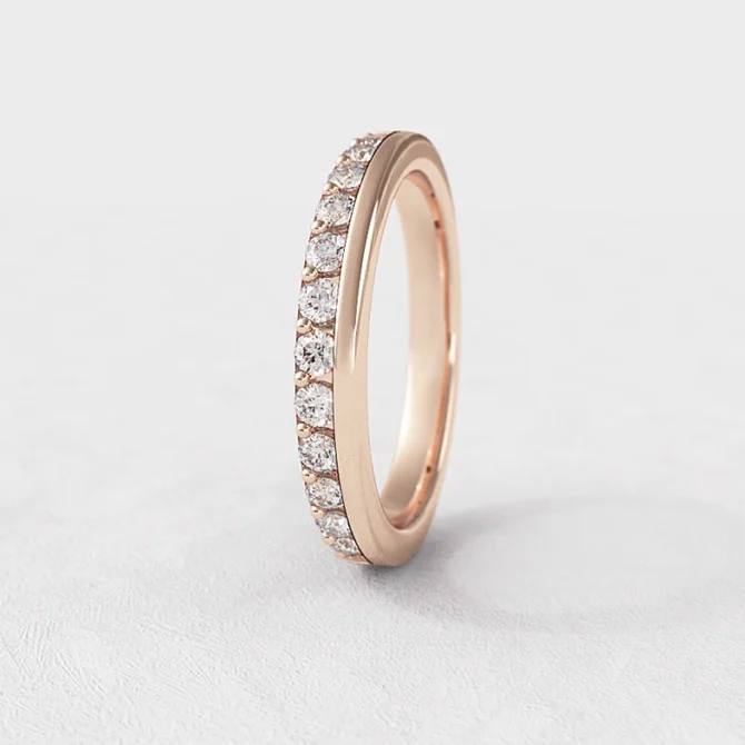 Claw set and plain diamond set ladies wedding ring in rose gold sb4019