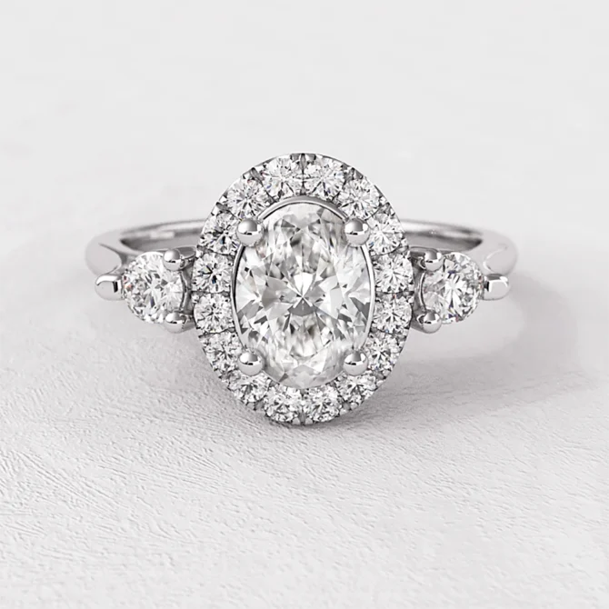 Oval Halo Trilogy Style Engagement Ring VR1100 in white gold