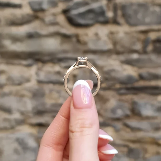 Twist style diamond engagement ring in rose gold pr1007 side view