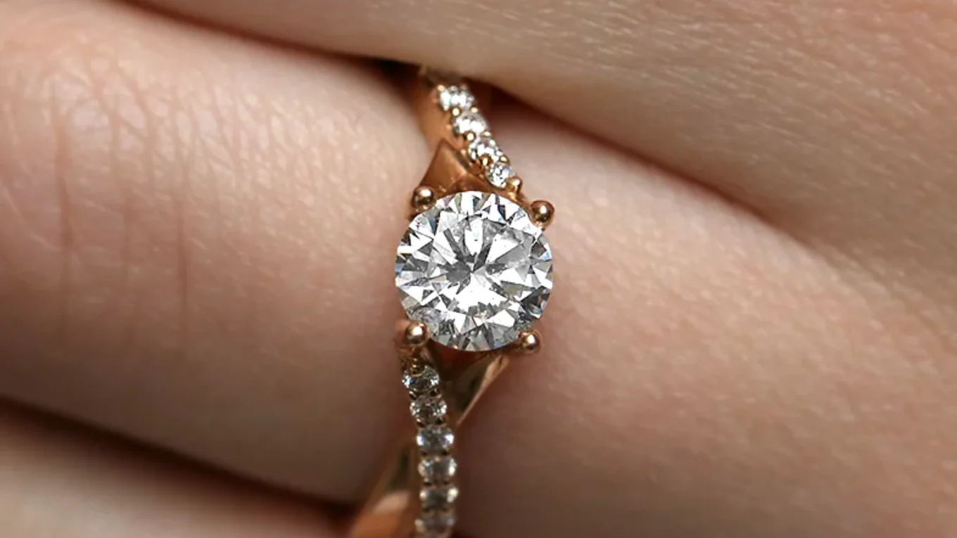 rose gold twist style diamond engagement ring on hand pr1007-1