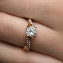 rose gold twist style diamond engagement ring on hand pr1007-1