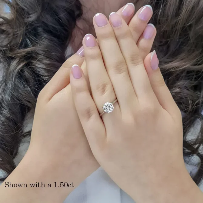 1.50ct round brilliant cut diamond ring on hand image 2
