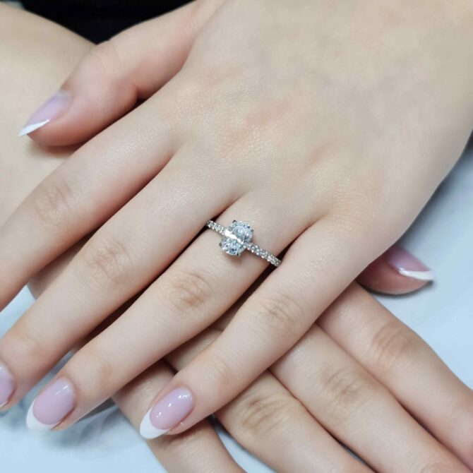 lab grown oval diamond engagement ring IGI certified on hand