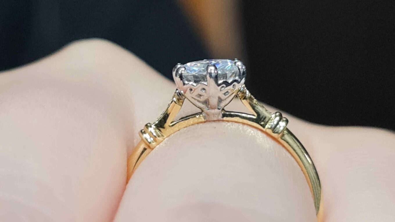 Vintage style diamond ring on hand in yellow gold pr1001