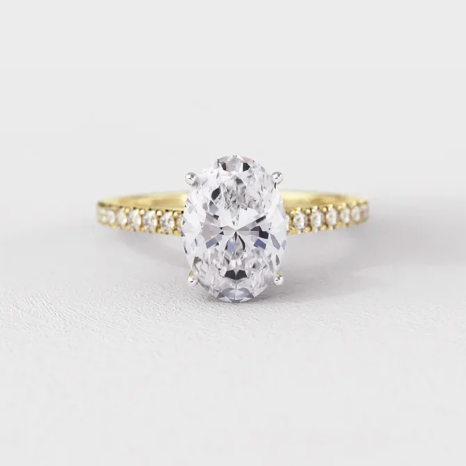 Claw set diamond oval cut engagement ring in yellow gold – pr1079