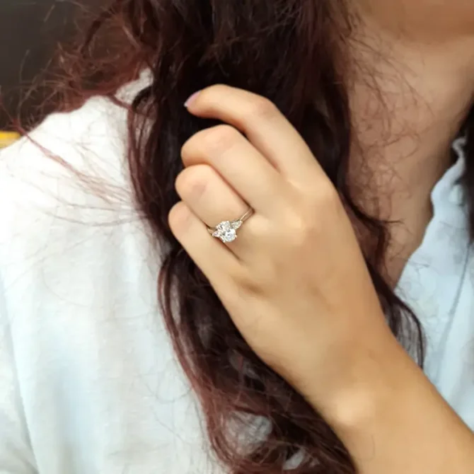 Oval and pear three stone ring on hand-tr1021-2