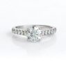 PR1013-round-cut-diamond-side-stone-engagement-ring-image-1