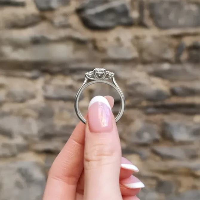 Round Cut Trilogy Engagement Ring in white gold TR1020 look-through view on hand