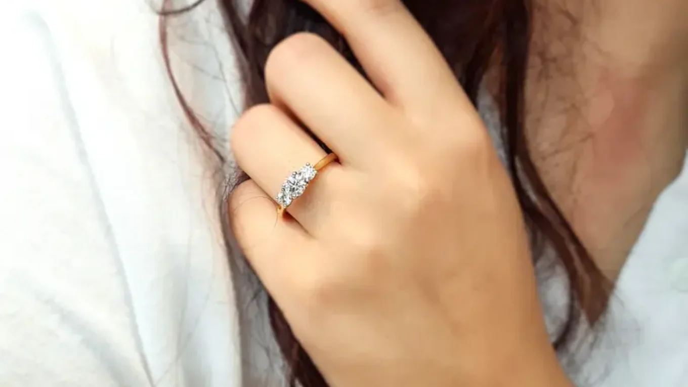 Trilogy diamond ring on hand-tr1020-2