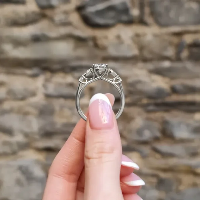 Trilogy style 3 stone round and pear cut engagement ring TR1046 white gold look through view