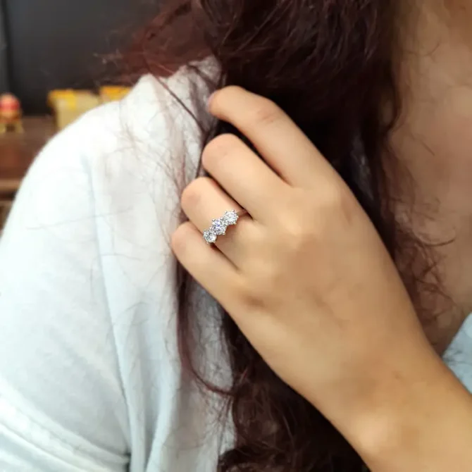 Vintage style 6 claw trilogy engagement ring on hand tr1058 made in Dublin Ireland