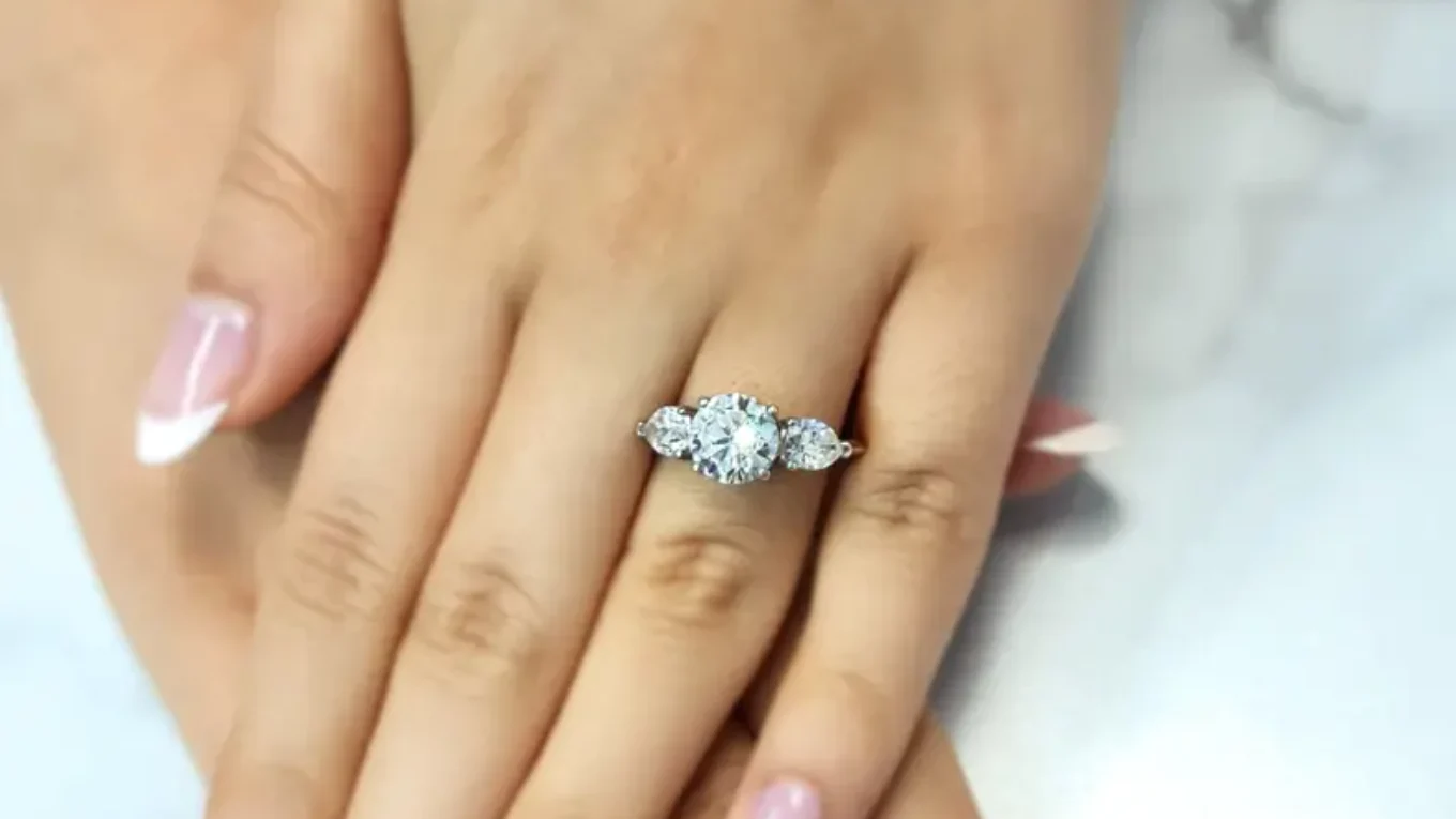 3.0ct round and pear cut trilogy diamond ring on hand tr1060 from Dublin, Ireland