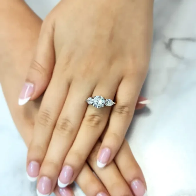3.0ct round and pear cut trilogy diamond ring on hand tr1060 from Dublin, Ireland