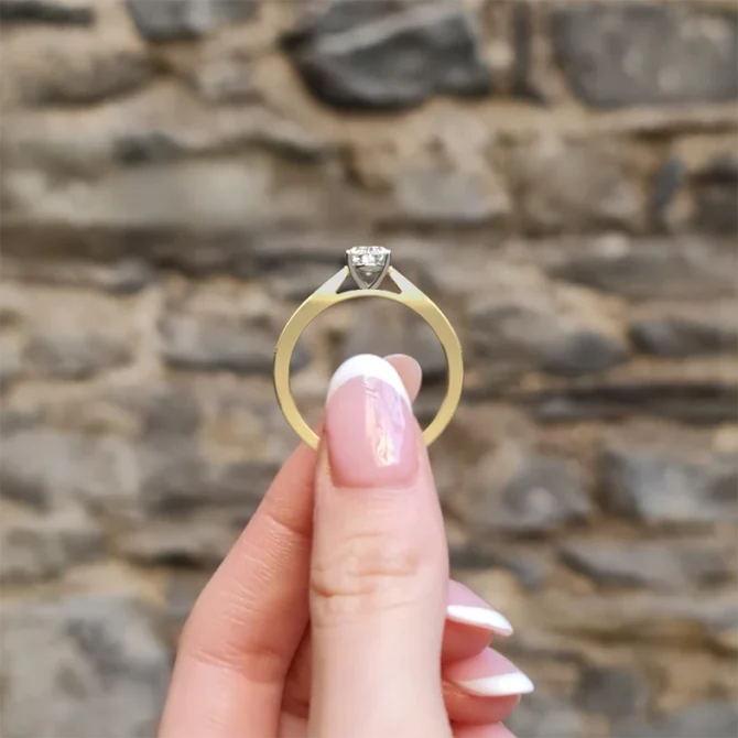 pave set oval cut diamond engagement ring side view in yellow gold pr1051