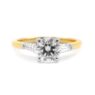 Bespoke designed round and baguette cut three stone diamond engagement ring
