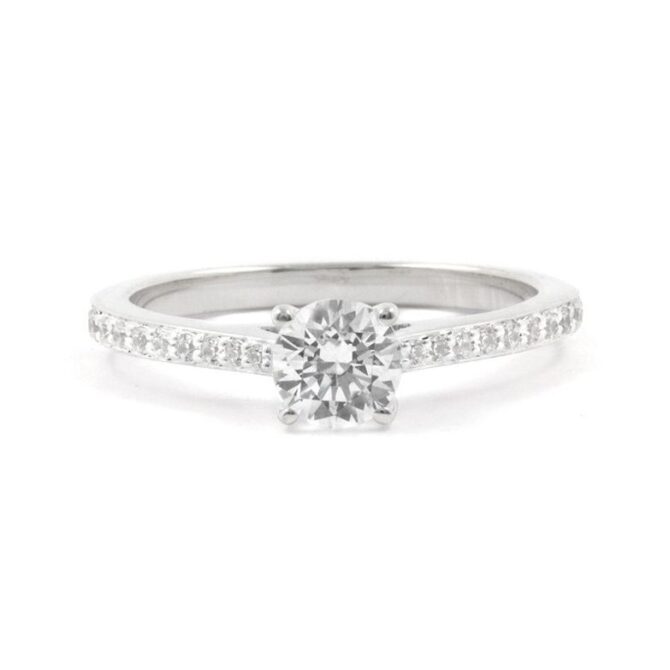 Custom made side stone diamond engagement ring