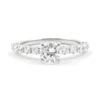 Side stone custom made diamond engagement ring