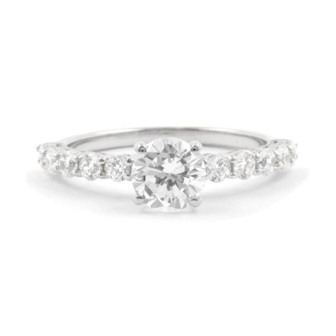 Side stone custom made diamond engagement ring