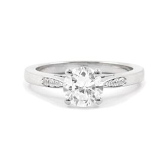 Custom made side stone diamond engagement ring