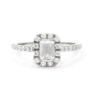 Emerald cut bespoke designed halo diamond engagement ring