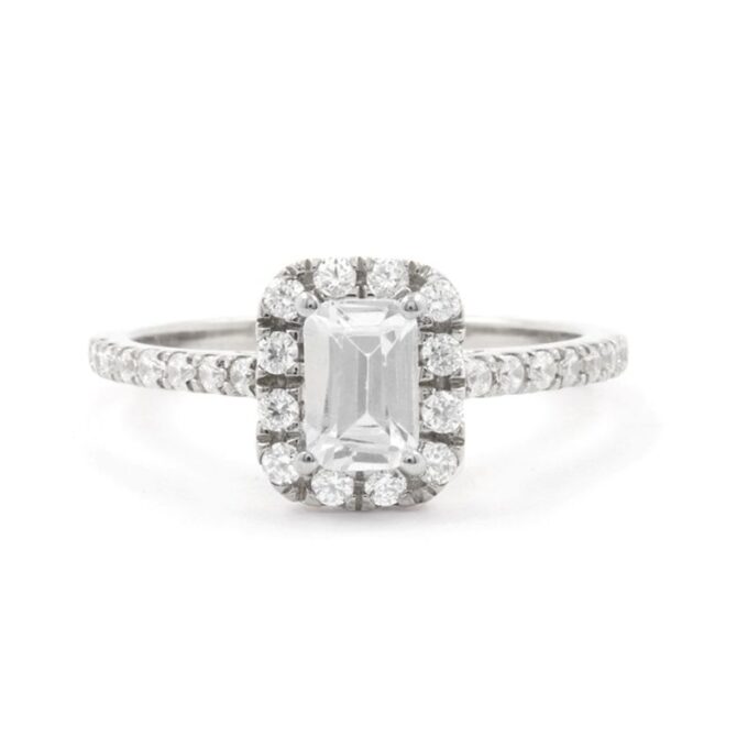 Emerald cut bespoke designed halo diamond engagement ring