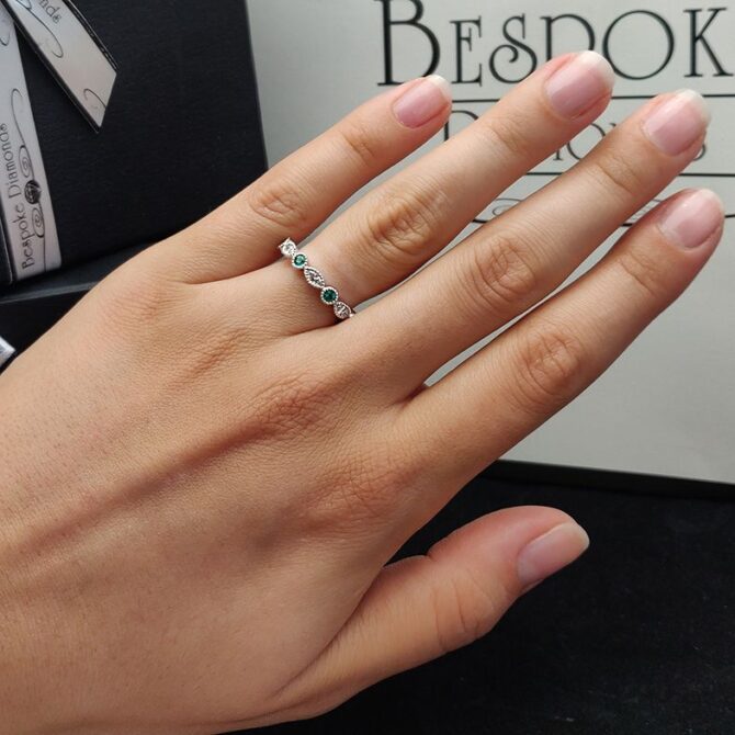 emerald-and-diamond-gemstone-ring-on-hand-cr1037-image-1