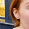 1.0ct diamond stud earrings in ear in Dublin Ireland with red hair
