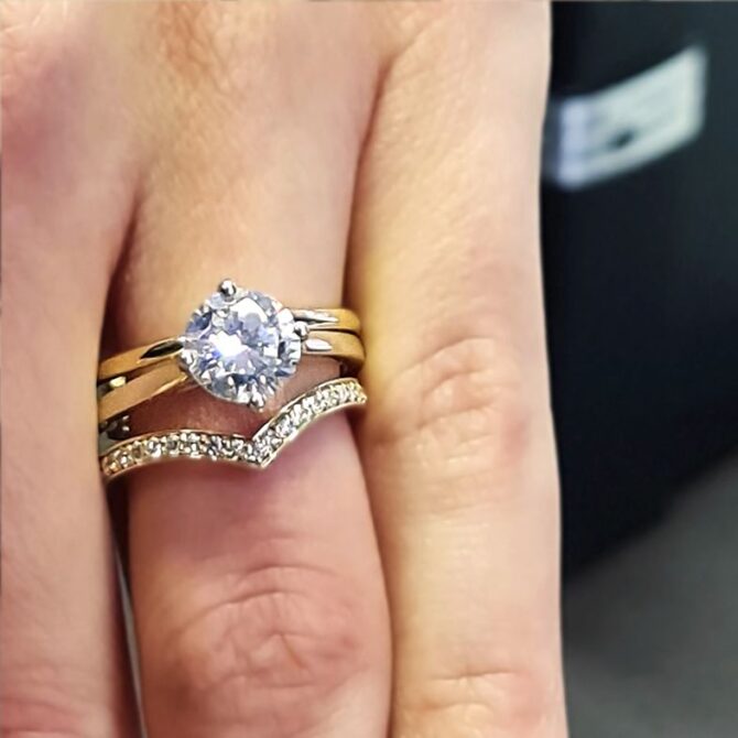 SR1059-18k-yellow-gold-compass-set-solitaire-diamond-engagement-ring-with-wedding-ring-on-hand-image-3