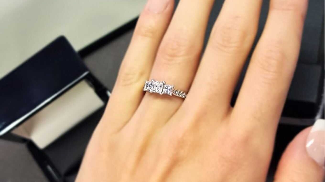 TR1076-princess-cut-diamond-three-stone-ring-on-hand-image-1