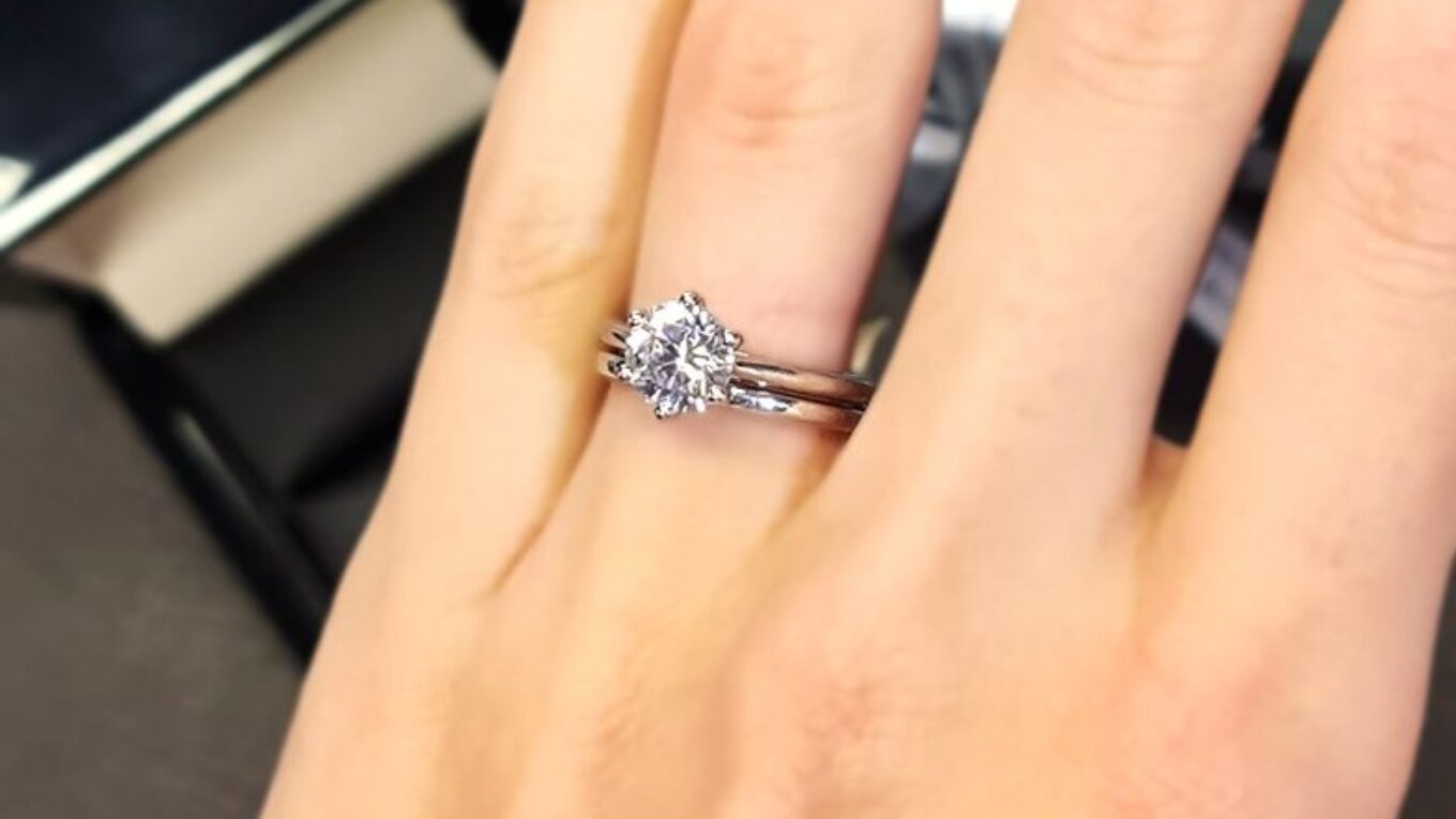 sr1010-lab-grown-round-cut-diamond-solitaire-engagement-ring-with-wedding-ring-on-hand-image-2