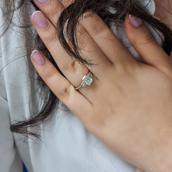 1.15ct Emerald Cut Side Stone Ring PR1069 on hand 2