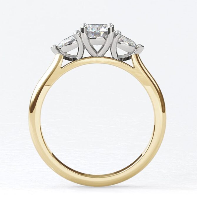 tr1034-18k-yellow-gold-round-and-pear-cut-diamond-three-stone-ring-image-1