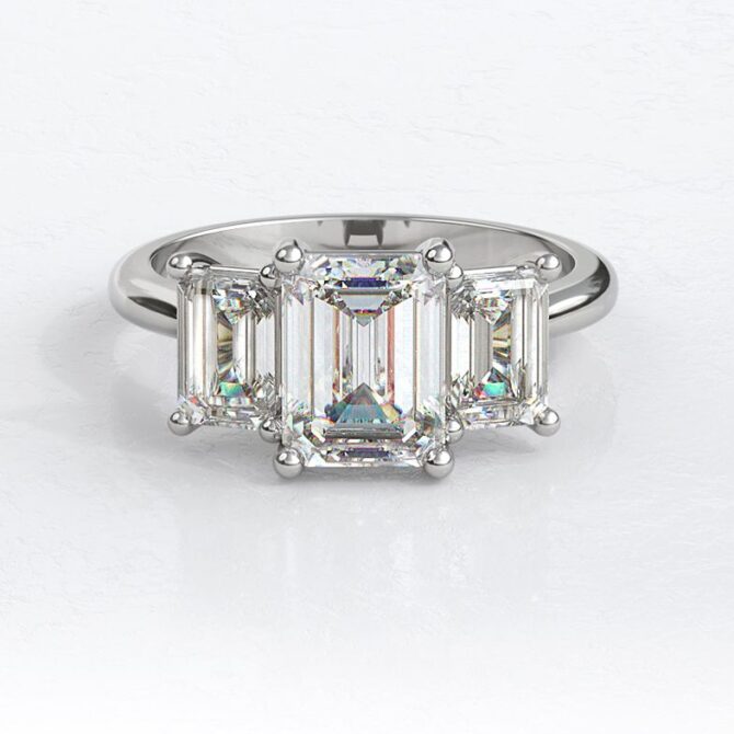 SB1819-bespoke-designed-emerald-cut-diamond-trilogy-ring-image-1