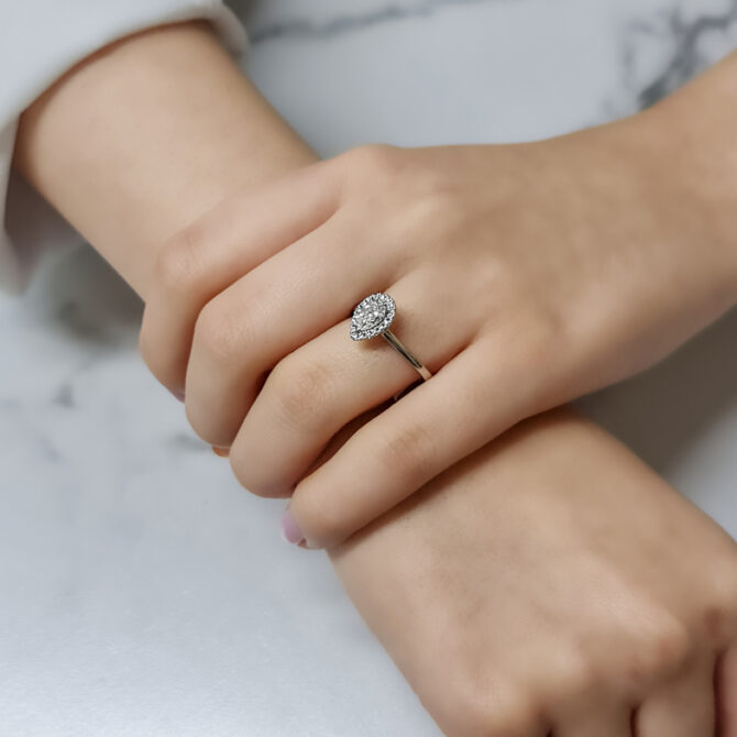 0.65 Carat Pear Cut Ring VR2094 on hand 3