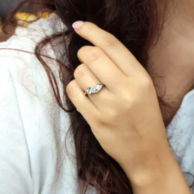 Twist 3 stone diamond ring on hand tr2009 made by Bespoke Diamonds in Dublin Ireland