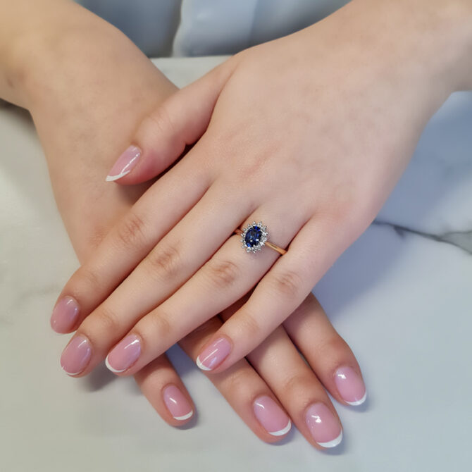 0.85ct Oval Cut Sapphire Halo Ring CR1046 on hand 4