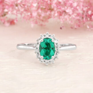 CR1047-0.85ct-18k-white-gold-oval-cut-emerald-and-diamond-gemstone-ring-image-01