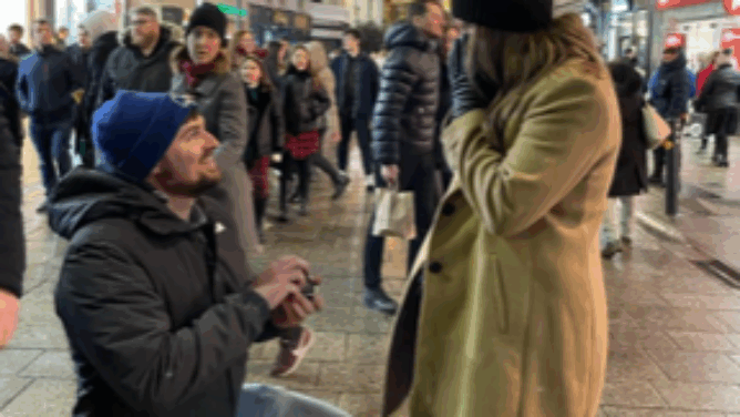 Engaged couple on Grafton Street, Dublin