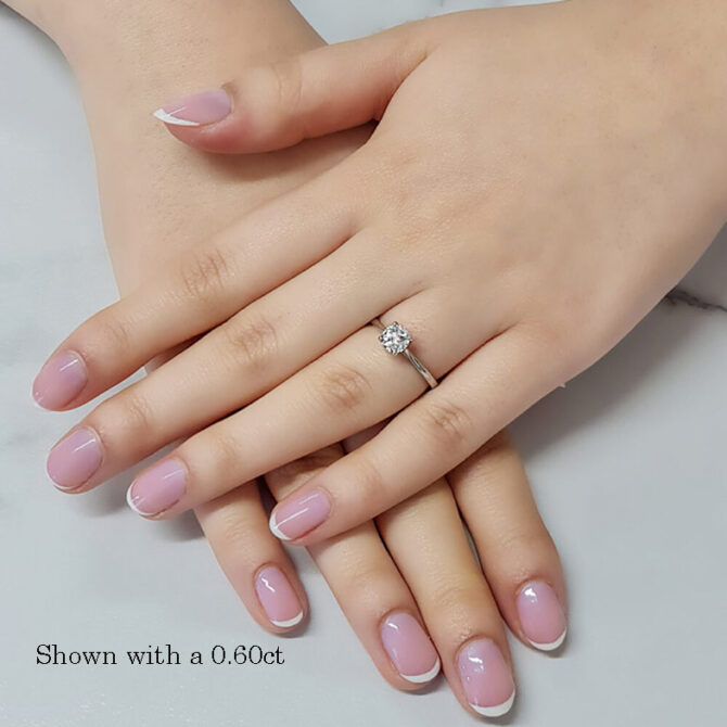 0.60-Carat-Round-Cut-Four-Claw-Tulip-Bespoke-Engagement-Ring-on-hand-image2