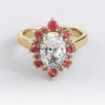 Custom made oval cut diamond and ruby halo engagement ring sb2739 image 01