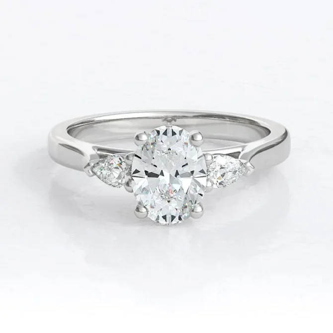 tr1021-18k-white-gold-oval-and-pear-cut-diamond-three-stone-ring-image-1