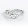 tr1021-18k-white-gold-oval-and-pear-cut-diamond-three-stone-ring-image-1