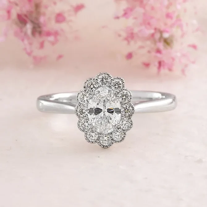 vr2090-platinum-0.81ct-floral-style-oval-cut-halo-ring-image-1